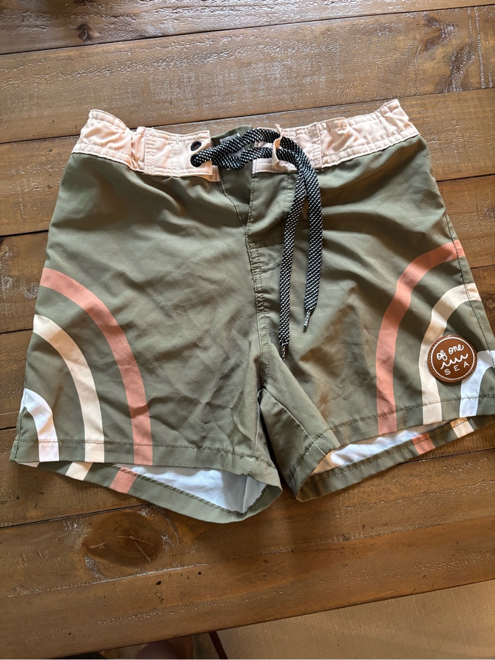 Of one sea boys 11/12 olive swim trunks